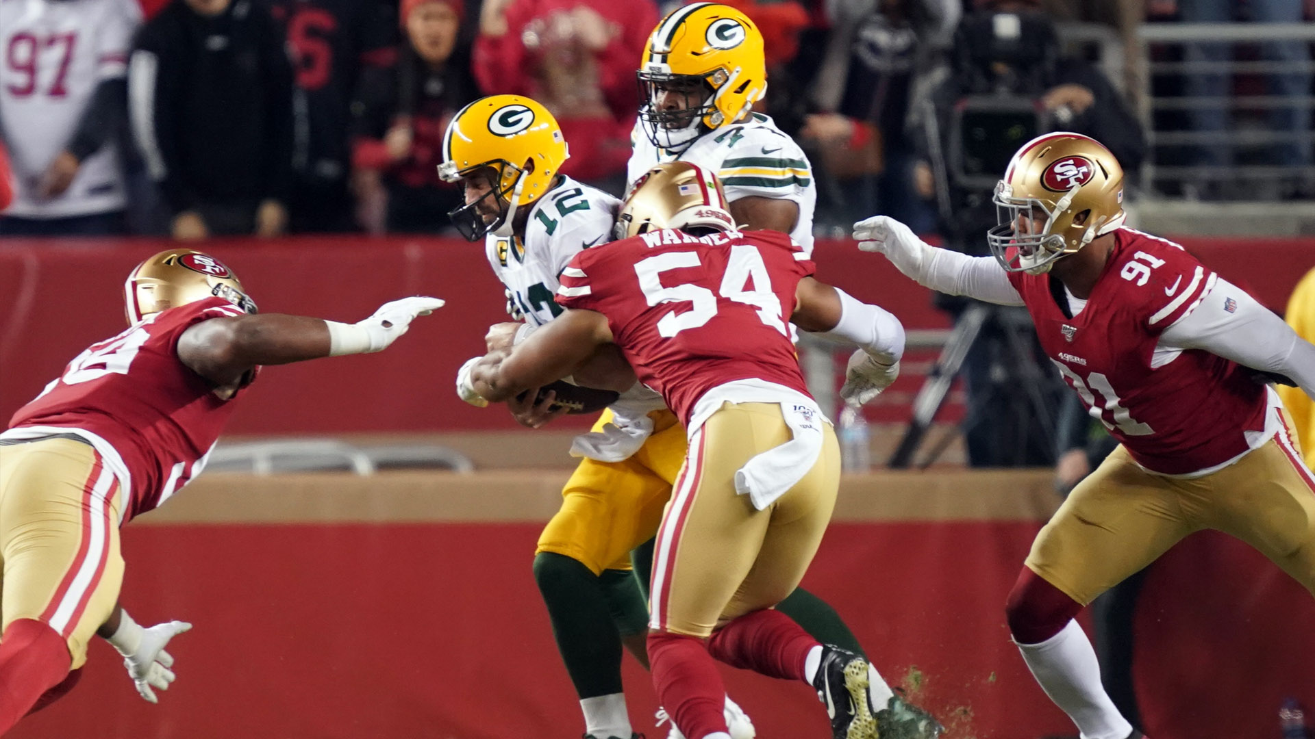 Niners swarm Aaron Rodgers for key early strip-sack