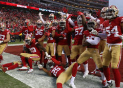 49ersdefenseposeusatsi-9630c04f60aae2fb04071b5a795daaca65fc60e1